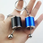Interactive manual gear shift keychain with movable lever