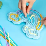 Rainbow maze board with colorful flexible silicone sticks for kids play