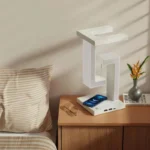 Levitating LED desk lamp with wireless charging and USB ports