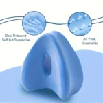 Contoured memory foam knee pillow for side sleepers and pain relief.