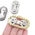 Metal bike chain fidget toy in silver, gold, and gunmetal