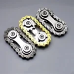 Metal bike chain fidget toy in silver, gold, and gunmetal