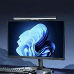 Sleek monitor light bar illuminating a modern desk setup