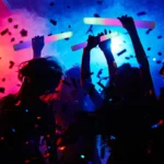 Multi-color LED foam glow stick at a lively party event