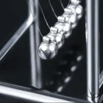 Newton's Cradle balance balls, chrome frame, black base