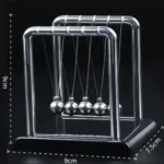 Newton's Cradle balance balls, chrome frame, black base