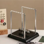Newton's Cradle balance balls, chrome frame, black base