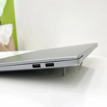 Portable adhesive foldable laptop stand for ergonomic typing