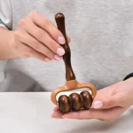 Handheld wooden muscle roller for deep tissue massage