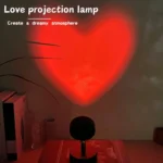 Red heart projection lamp creating romantic bedroom ambiance
