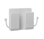 Self-adhesive wall phone holder with charging slot and side hooks