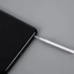 Smartphone port cleaning kit with brushes and dust plugs