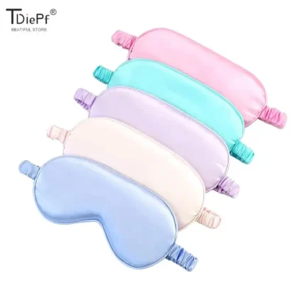 Soft satin sleep mask set in pastel colors for relaxation.