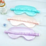 Soft satin sleep mask set in pastel colors for relaxation.