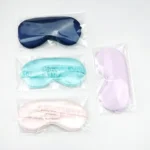Soft satin sleep mask set in pastel colors for relaxation.
