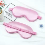 Soft satin sleep mask set in pastel colors for relaxation.