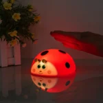Soft silicone ladybug night light with multi-color and dimmable settings