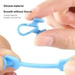 Soft silicone nasal dilator for improved breathing and snoring relief.