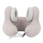 U-shaped travel neck pillow with integrated headphones and adjustable strap.